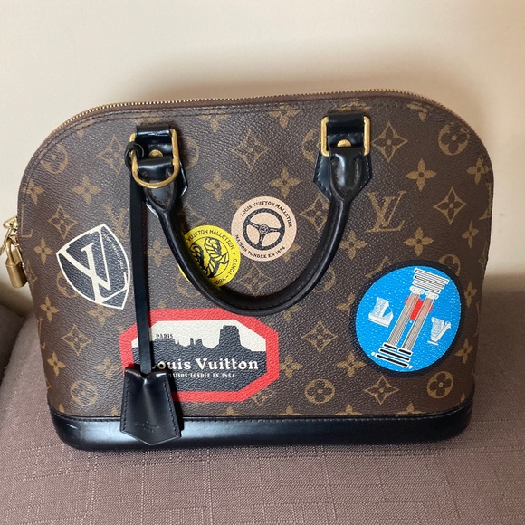 Louis Vuitton Monogram World Tour Alma PM Bag - Picture 2 of 5